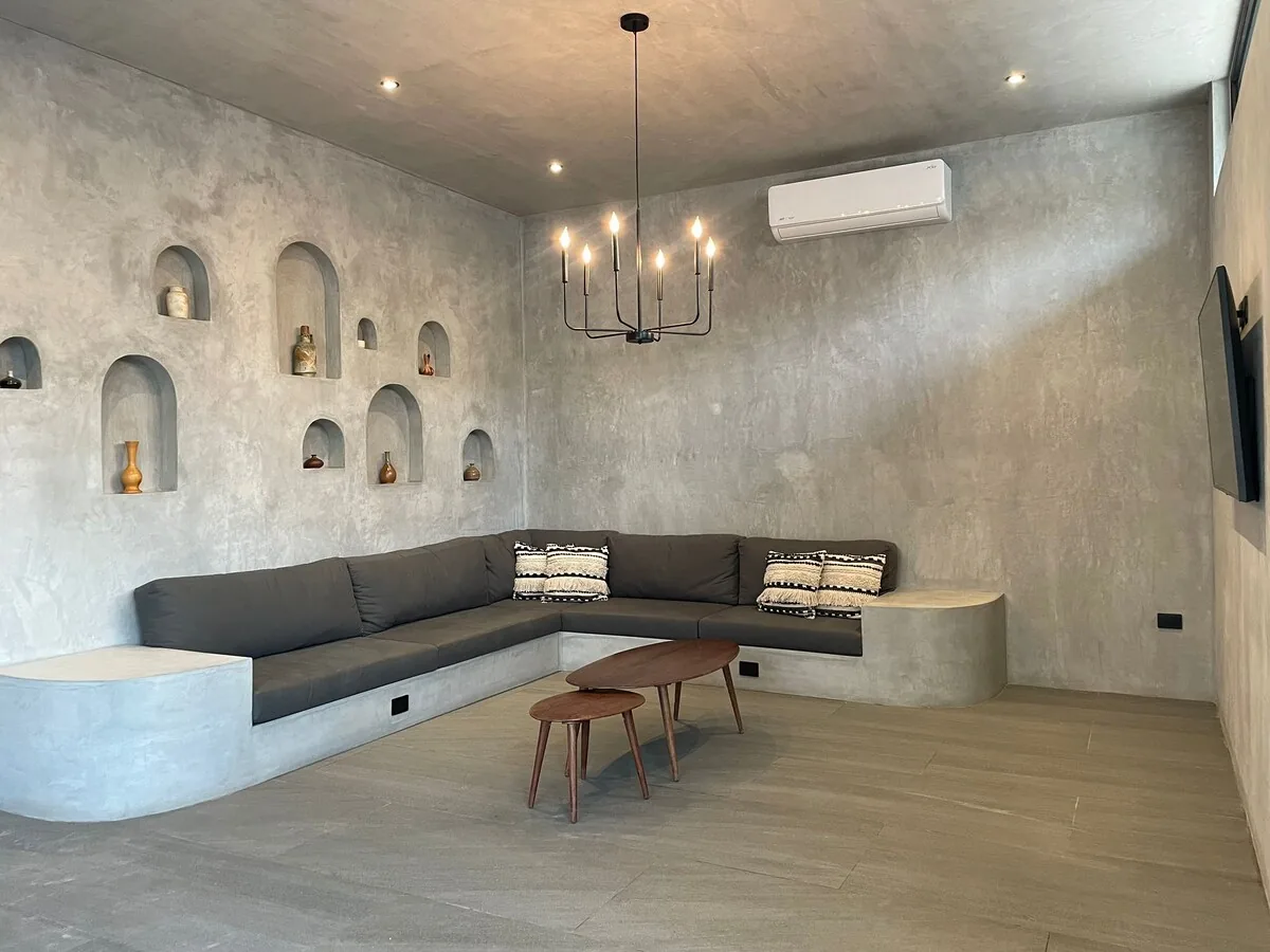 Casa Arroqueno sleek polished gray concrete interiors with minimalist gallery-like atmosphere