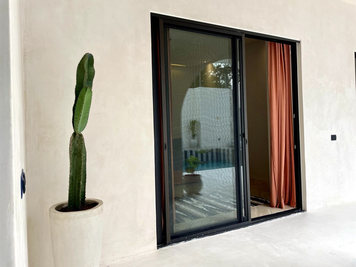 Casa Bali fully equipped kitchen in minimalist tropical vacation rental near Tulum center