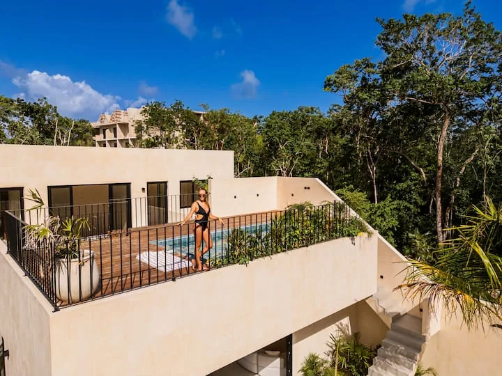 Casa Dalida rooftop pool with panoramic jungle views