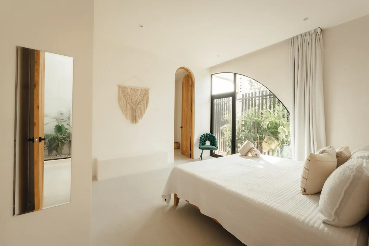 Casa Lancelot outdoor living space with tropical surroundings