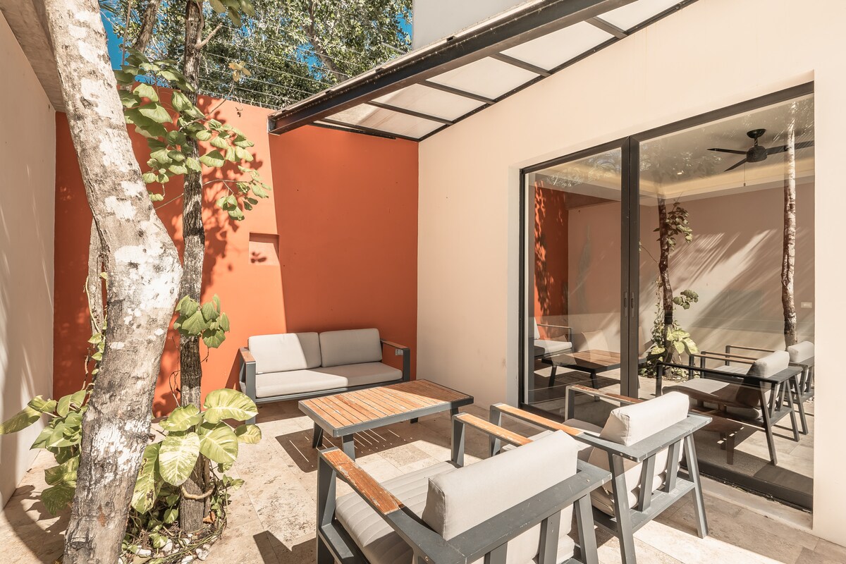 Casa Sueño designer kitchen with modern appliances and natural materials in tropical setting